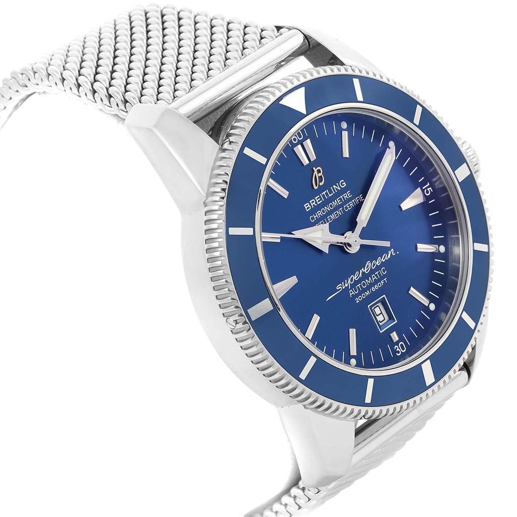 The image shows a side angle of the Breitling Superocean A17320 Men's Stainless Steel Blue Dial A17320 Men's Stainless Steel Blue Dial watch, highlighting the blue dial, bezel, and stainless steel mesh strap.