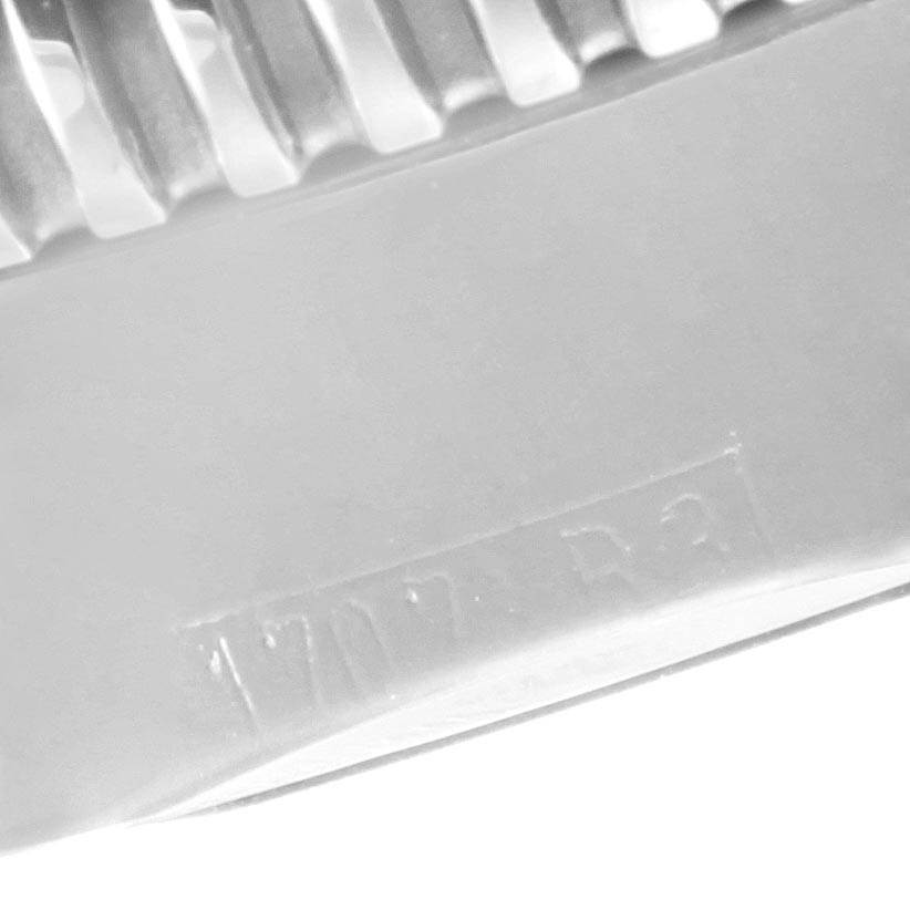 This image shows a close-up of the metal bracelet of a Breitling Superocean A17320 Men's Stainless Steel Blue Dial A17320 Men's Stainless Steel Blue Dial watch, emphasizing its links and part of the clasp.