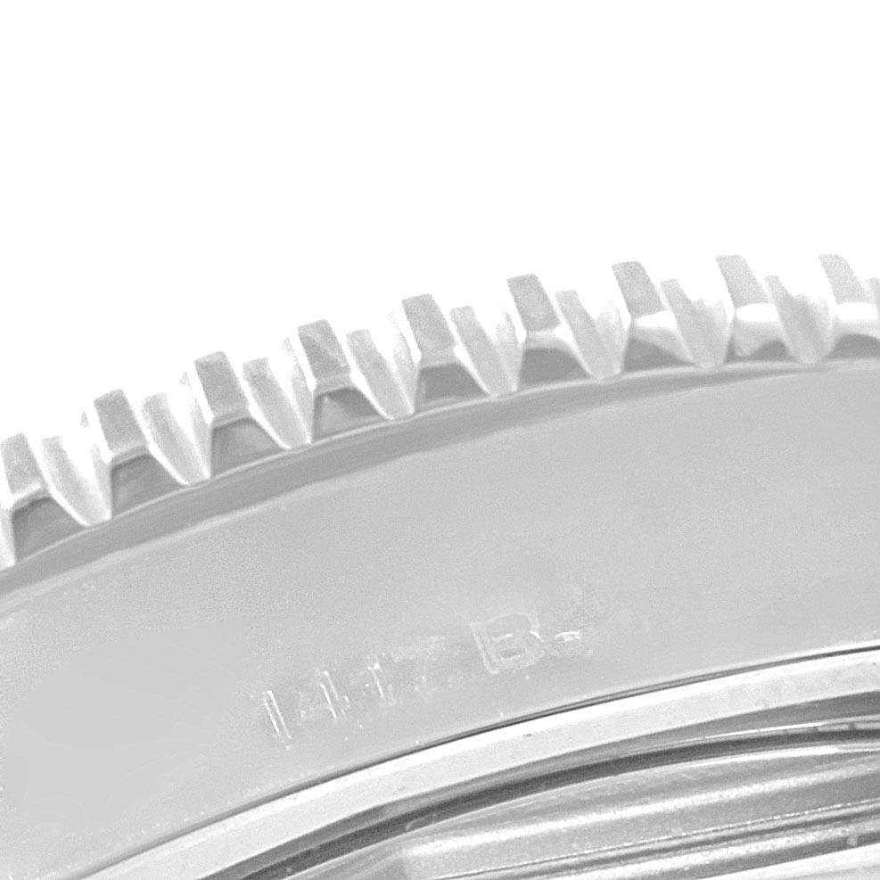 The image shows a close-up view of the bezel teeth of a Breitling Superocean A17365 Men's Stainless Steel Blue Dial A17365 Men's Stainless Steel Blue Dial watch.