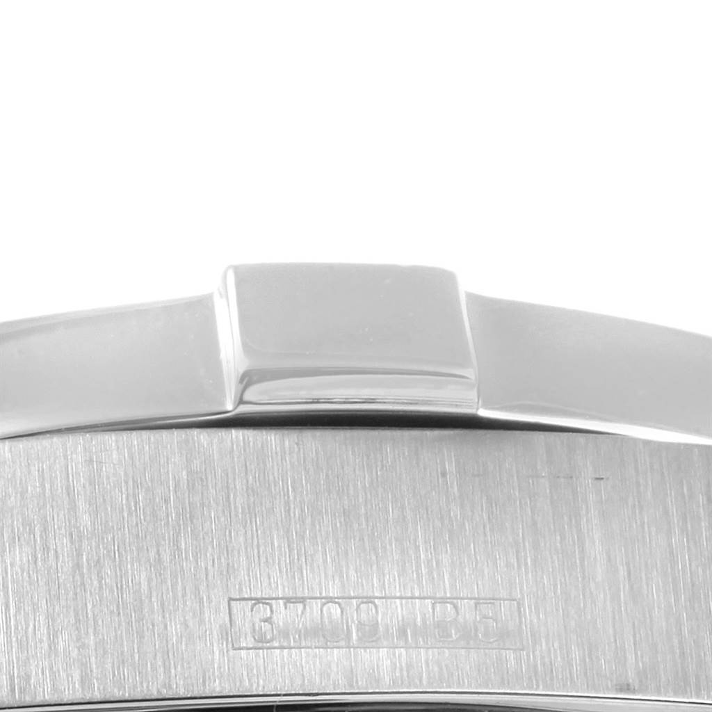 This image shows a close-up of the side and crown of a Breitling Superocean A17390 Men's Stainless Steel Black Dial A17390 Men's Stainless Steel Black Dial watch, highlighting the brushed and polished metal finishes.