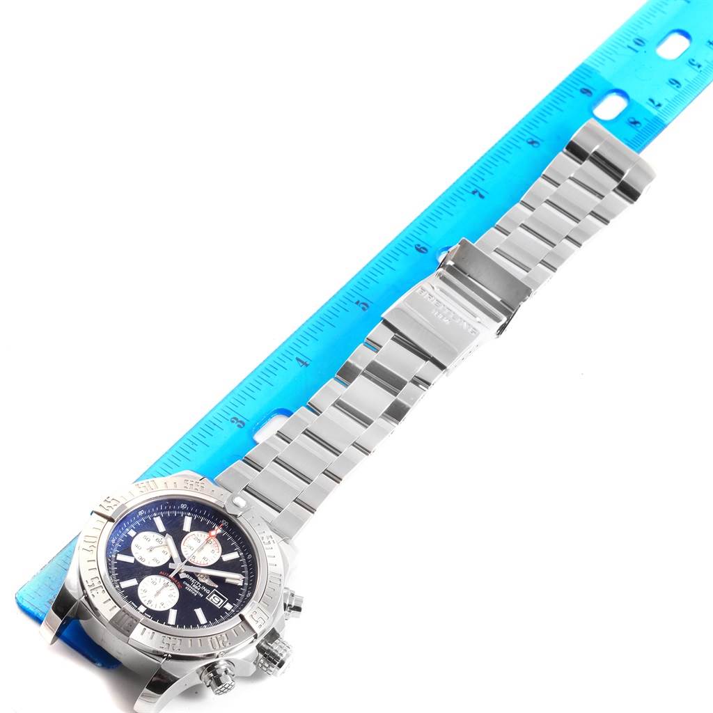 The image shows the front view of a Breitling Avenger A13371 Men's Stainless Steel Black Dial A13371 Men's Stainless Steel Black Dial watch, displaying its face, bezel, and bracelet alongside a ruler.