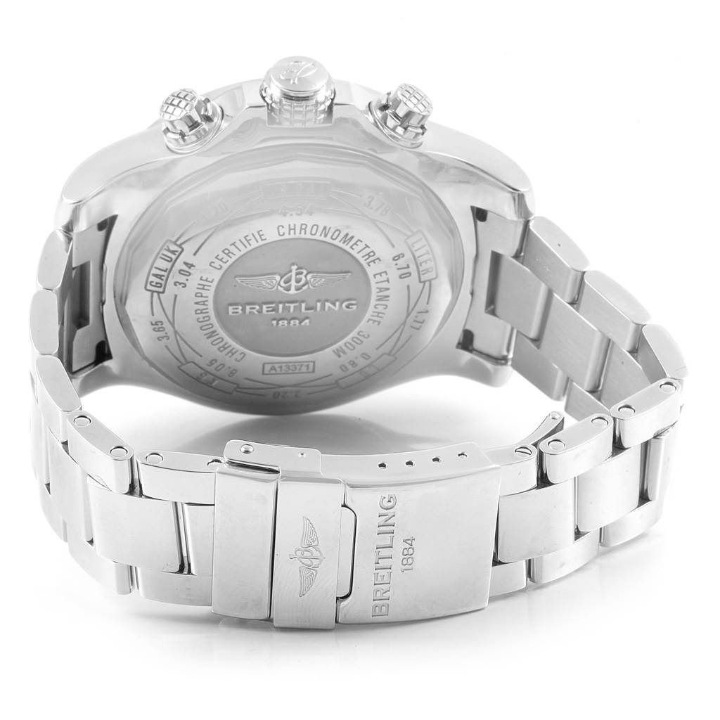 The image shows the Breitling Avenger A13371 Men's Stainless Steel Black Dial A13371 Men's Stainless Steel Black Dial watch from a rear angle, highlighting the case back and stainless steel bracelet.