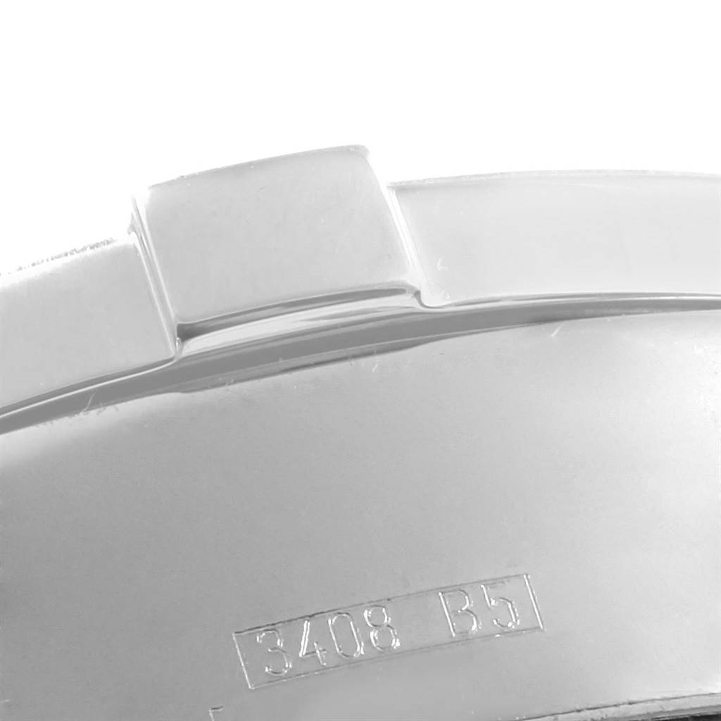 This close-up image shows part of the bracelet clasp and caseback of a Breitling Superocean A13340 Men's Stainless Steel Black Dial A13340 Men's Stainless Steel Black Dial watch.