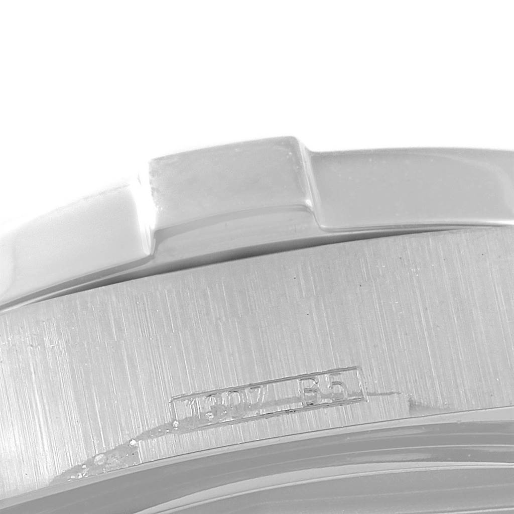 This image shows a close-up of the bezel and edge of the case of a Breitling Superocean A17390 Men's Stainless Steel Silver Dial A17390 Men's Stainless Steel Silver Dial watch.