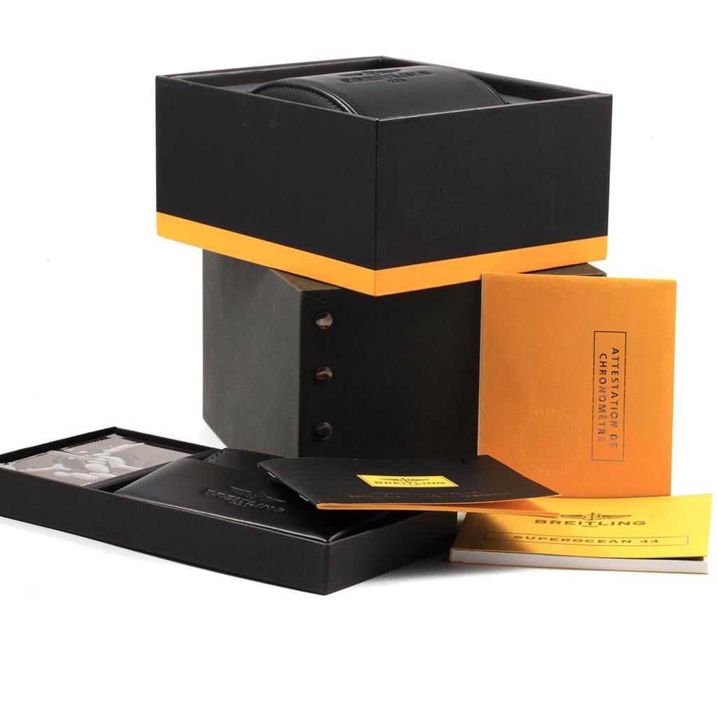 The image shows the packaging and booklets for the Breitling Superocean A17391 Men's Stainless Steel Black Dial A17391 Men's Stainless Steel Black Dial model from a front angle.