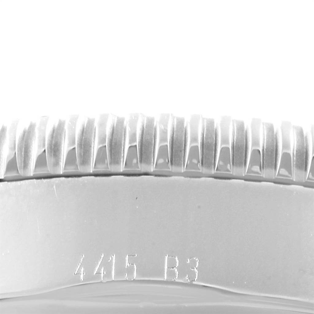 This image shows a close-up of the bezel and part of the case back of a Breitling Superocean A17320 Men's Stainless Steel Blue Dial A17320 Men's Stainless Steel Blue Dial watch.