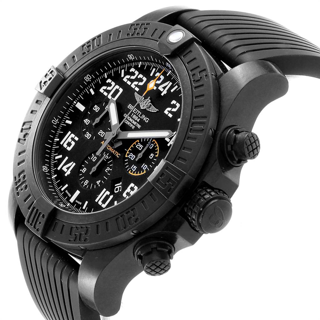 The Avenger watch by Breitling is shown at an angle displaying its black dial, bezel, chronograph subdials, and rubber strap.