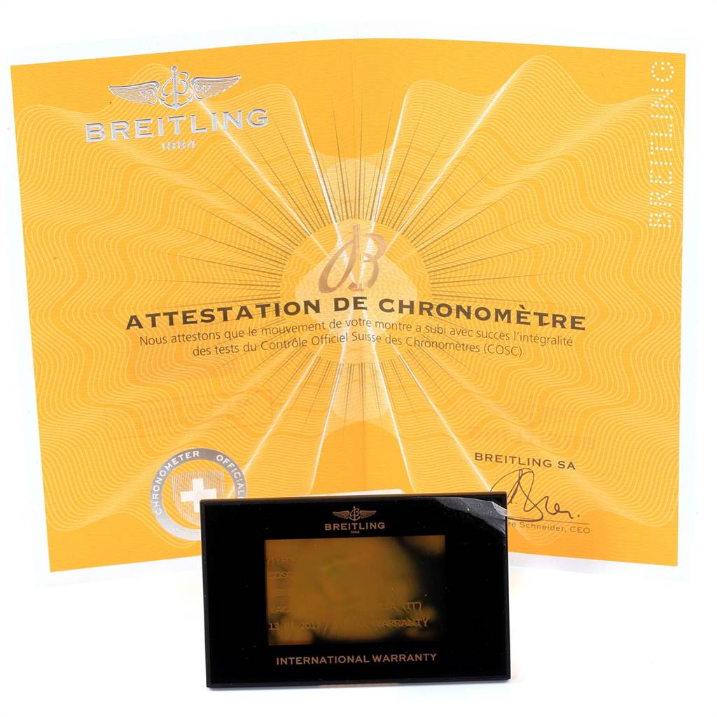 The image shows the Breitling Avenger XB1210E4/BE89-257S Men's Titanium Black Dial XB1210E4/BE89-257S Men's Titanium Black Dial warranty card and Chronometer Certificate from an overhead angle.