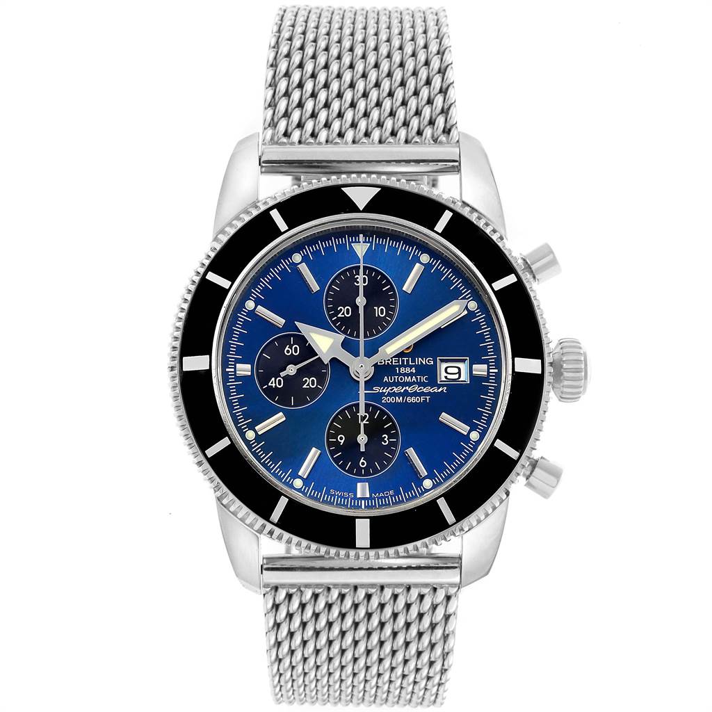 The image shows a straight-on view of a Breitling Superocean A13320 Men's Stainless Steel Blue Dial A13320 Men's Stainless Steel Blue Dial watch, highlighting its blue dial, chronograph subdials, and metal mesh strap.
