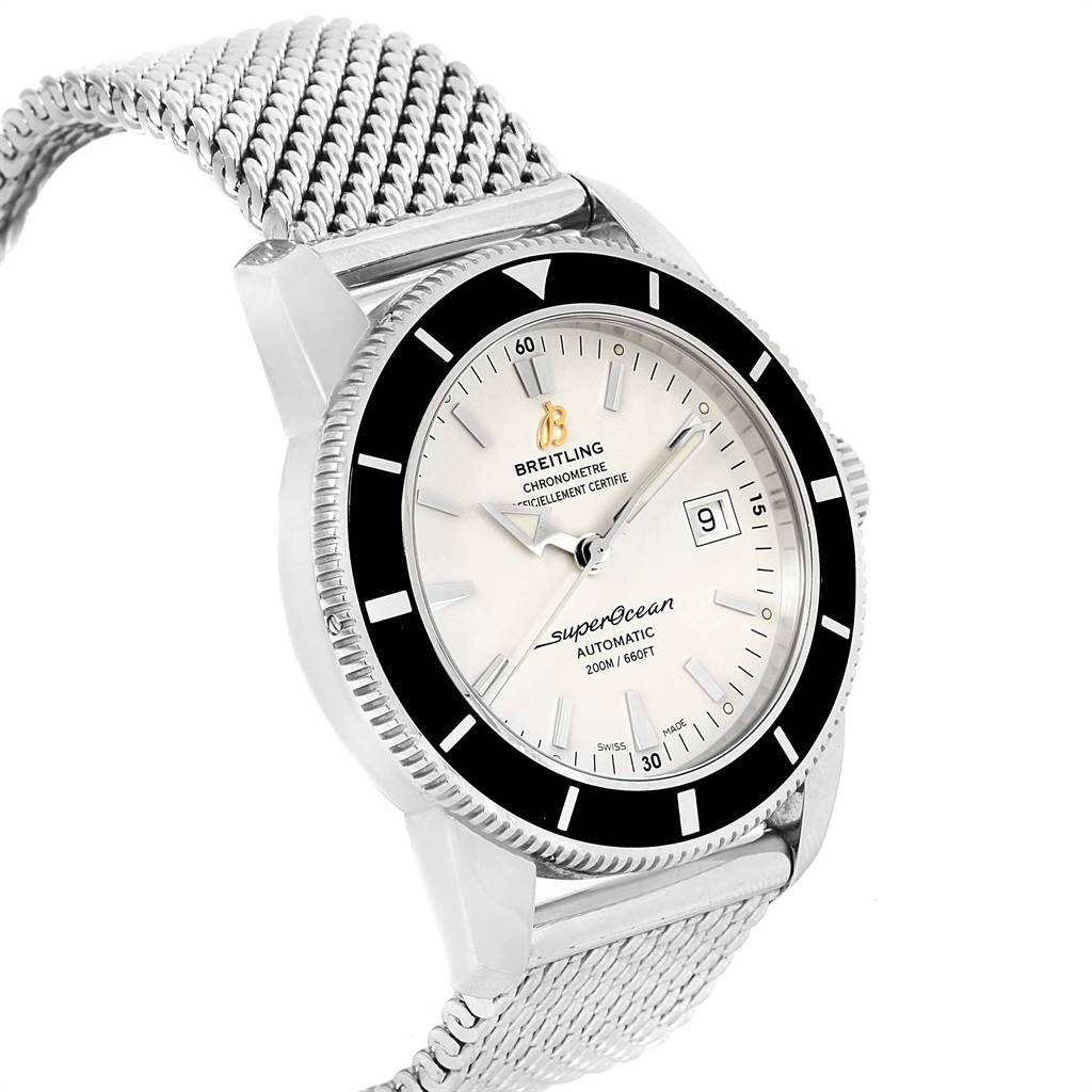 The image shows a Breitling Superocean A17321 Men
s Stainless Steel Silver Dial A17321 Men
s Stainless Steel Silver Dial watch at an angled view, highlighting its face, bezel, and metal mesh band.