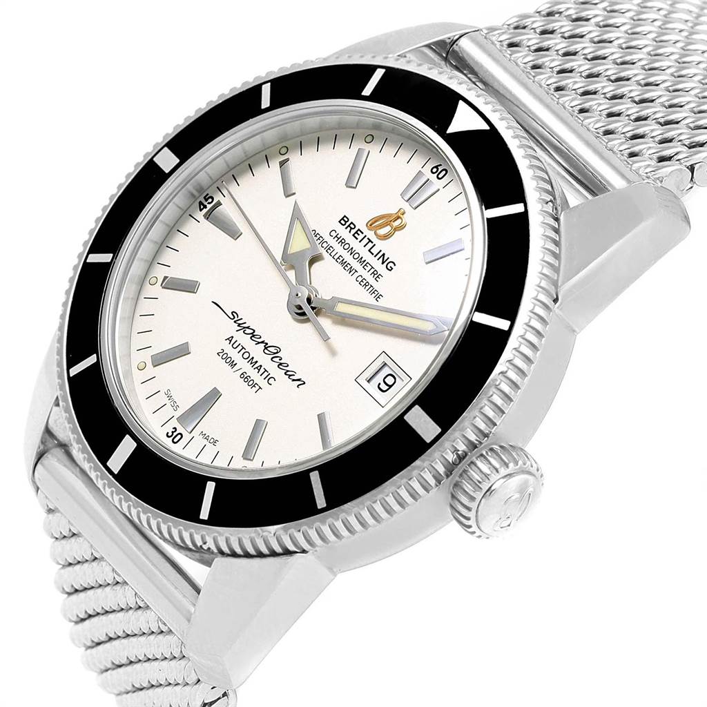 The image shows a Breitling Superocean A17321 Men
s Stainless Steel Silver Dial A17321 Men
s Stainless Steel Silver Dial watch at an angled close-up, highlighting its dial, bezel, and metal mesh strap.