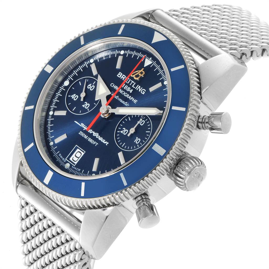 This image shows a Breitling Superocean A2337 Men
s Stainless Steel Blue Dial A2337 Men
s Stainless Steel Blue Dial watch at an angle highlighting the face, bezel, and part of the mesh bracelet.