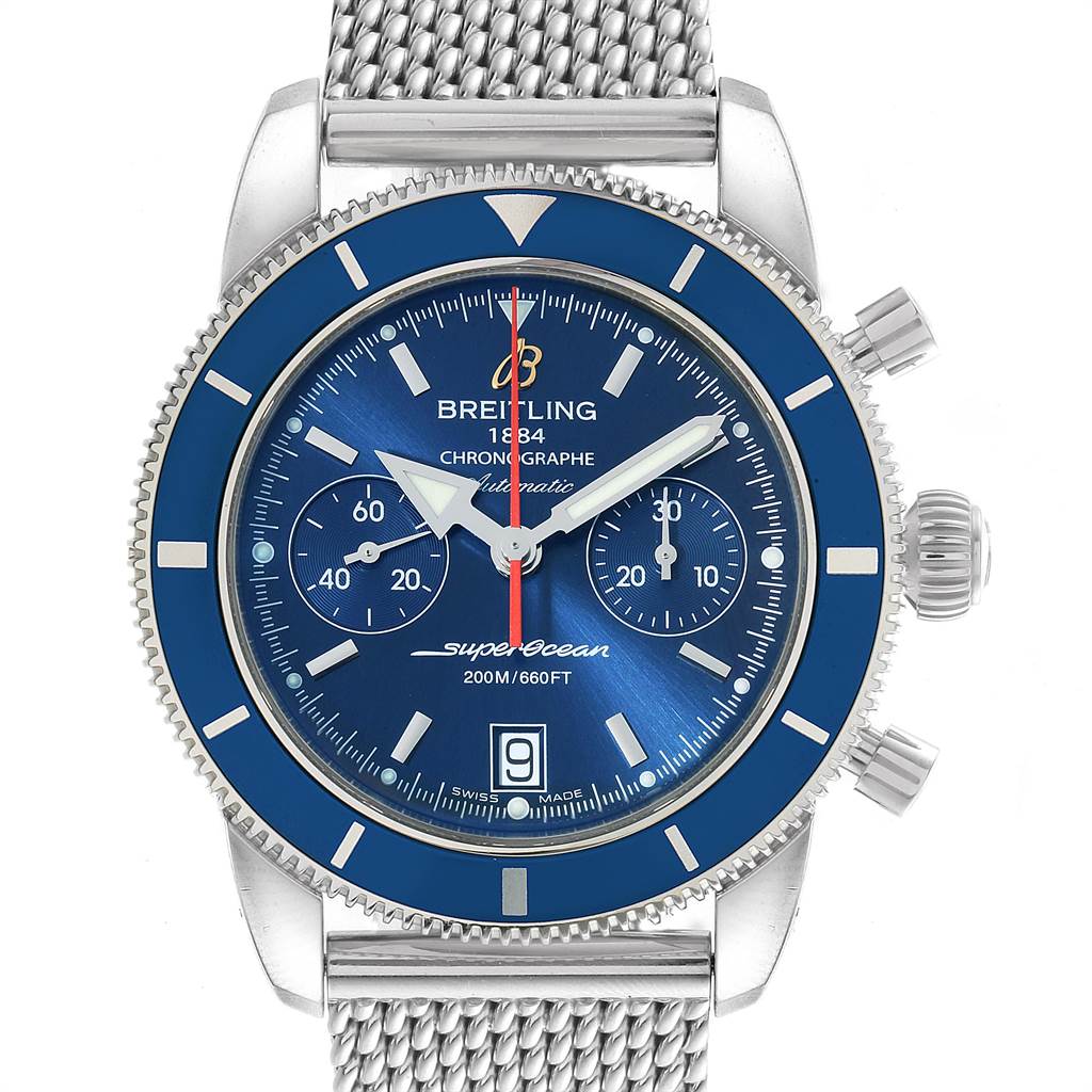 The image shows a frontal view of a Breitling Superocean A2337 Men
s Stainless Steel Blue Dial A2337 Men
s Stainless Steel Blue Dial watch with a blue dial, silver mesh band, and chronograph subdials.