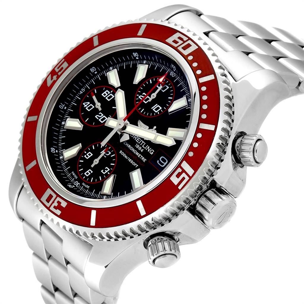 The image shows a close-up angle of the Breitling Superocean A13341 Men's Stainless Steel Black Dial A13341 Men's Stainless Steel Black Dial watch highlighting its red bezel, chronograph dials, and crown.