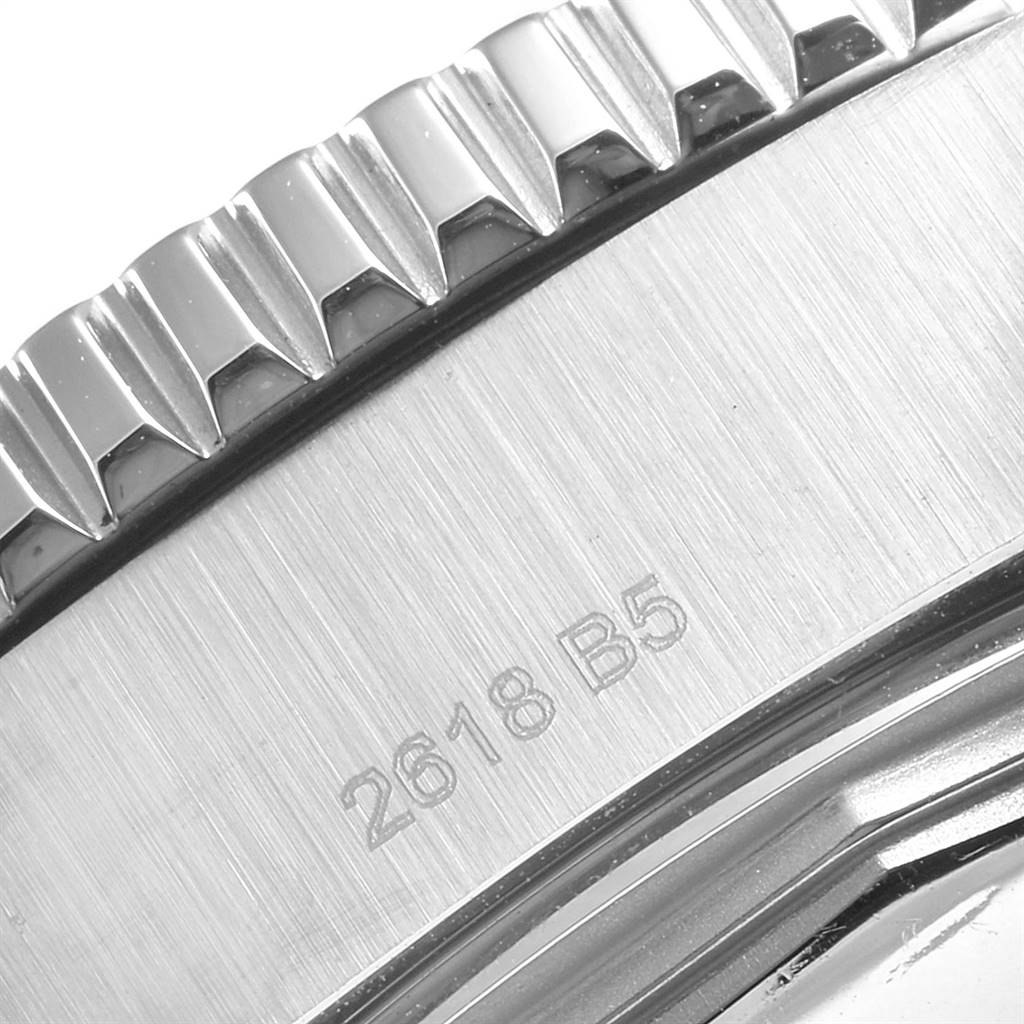 This close-up image of a Breitling Superocean A17392D8/C910 Men's Stainless Steel Black Dial A17392D8/C910 Men's Stainless Steel Black Dial watch shows the engraved model number and a portion of the bezel.