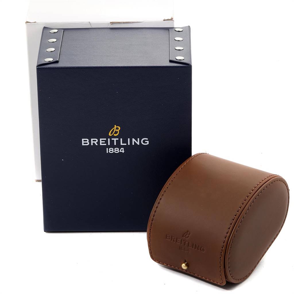 The image shows a Breitling Superocean A17320 Men
s Stainless Steel Black Dial A17320 Men
s Stainless Steel Black Dial watch box and a brown leather watch case, both with the Breitling logo.