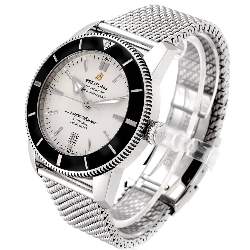 This image shows a Breitling Superocean AB2020 Men's Stainless Steel Silver Dial AB2020 Men's Stainless Steel Silver Dial watch at an oblique angle, highlighting its face, bezel, crown, and metal mesh strap.