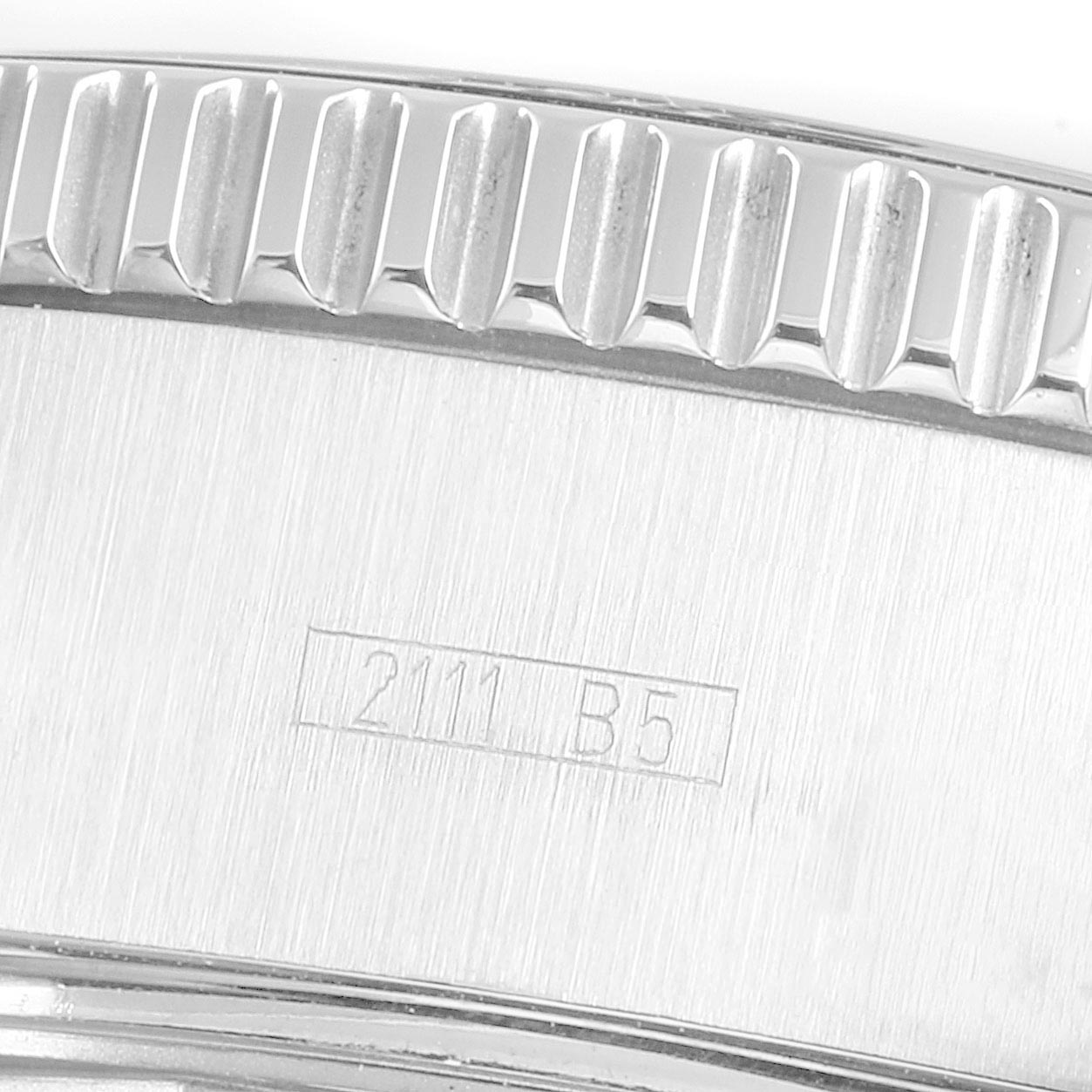 The image shows a close-up of the case edge and bezel of a Breitling Superocean A13341 Men's Stainless Steel Black Dial A13341 Men's Stainless Steel Black Dial watch, highlighting the serial number engraving.