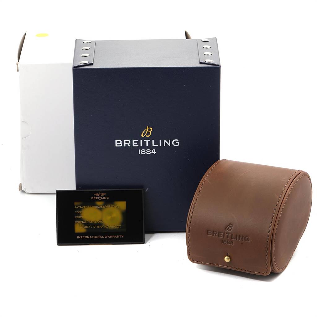 The image shows the original box, warranty card, and leather case for a Breitling Avenger XB12101A/BF46-283S Men's Titanium Black Dial XB12101A/BF46-283S Men's Titanium Black Dial watch.
