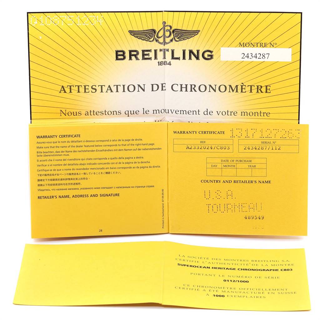 The image shows the warranty certificate and chronometer certification for the Breitling Superocean A23320 Men
s Stainless Steel Blue Dial A23320 Men
s Stainless Steel Blue Dial watch model.