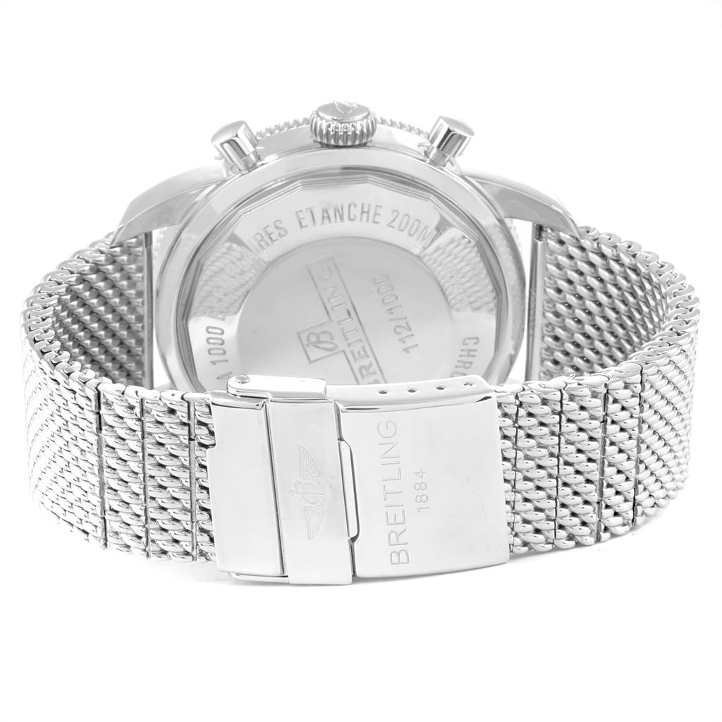 The image shows the back of a Breitling Superocean A23320 Men
s Stainless Steel Blue Dial A23320 Men
s Stainless Steel Blue Dial watch, highlighting the case back and metal mesh strap with the Breitling clasp.