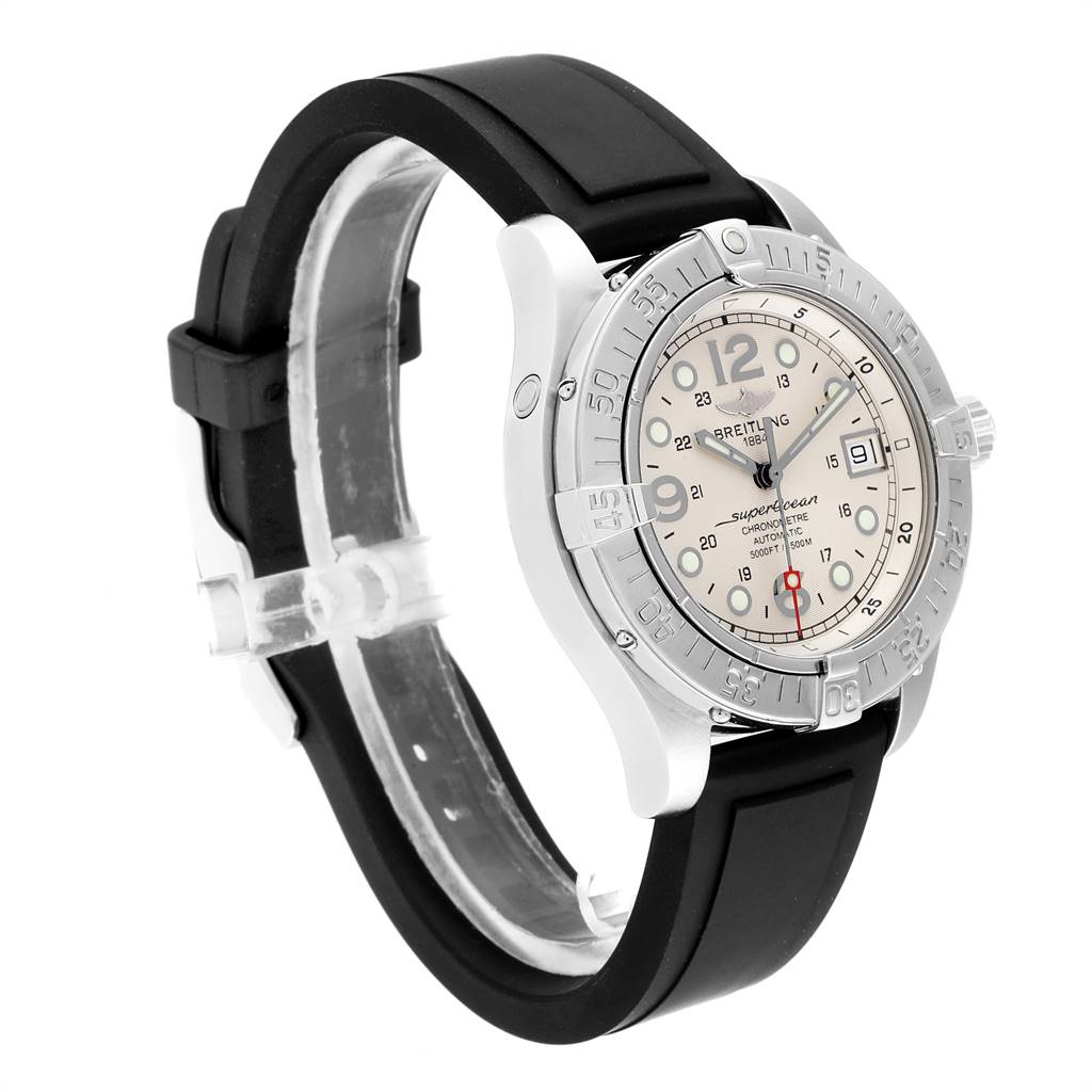 The Breitling Superocean A17360 Men's Stainless Steel Beige Dial A17360 Men's Stainless Steel Beige Dial watch is shown at a three-quarter angle, highlighting its bezel, dial, and black rubber strap.