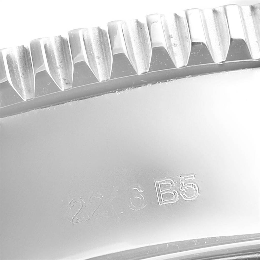 The image shows a close-up of the bezel with its serrated edge and engraved numbers on the Breitling Superocean A13311 Men's Stainless Steel Blue Dial A13311 Men's Stainless Steel Blue Dial watch.