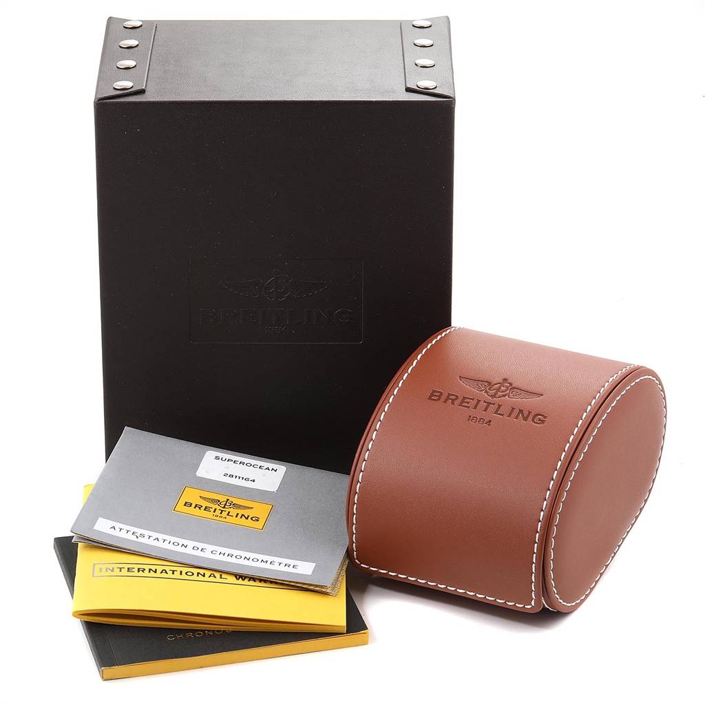 The image shows the packaging and accessories for a Breitling Superocean A13311 Men's Stainless Steel Blue Dial A13311 Men's Stainless Steel Blue Dial watch including the box, case, and accompanying booklets.