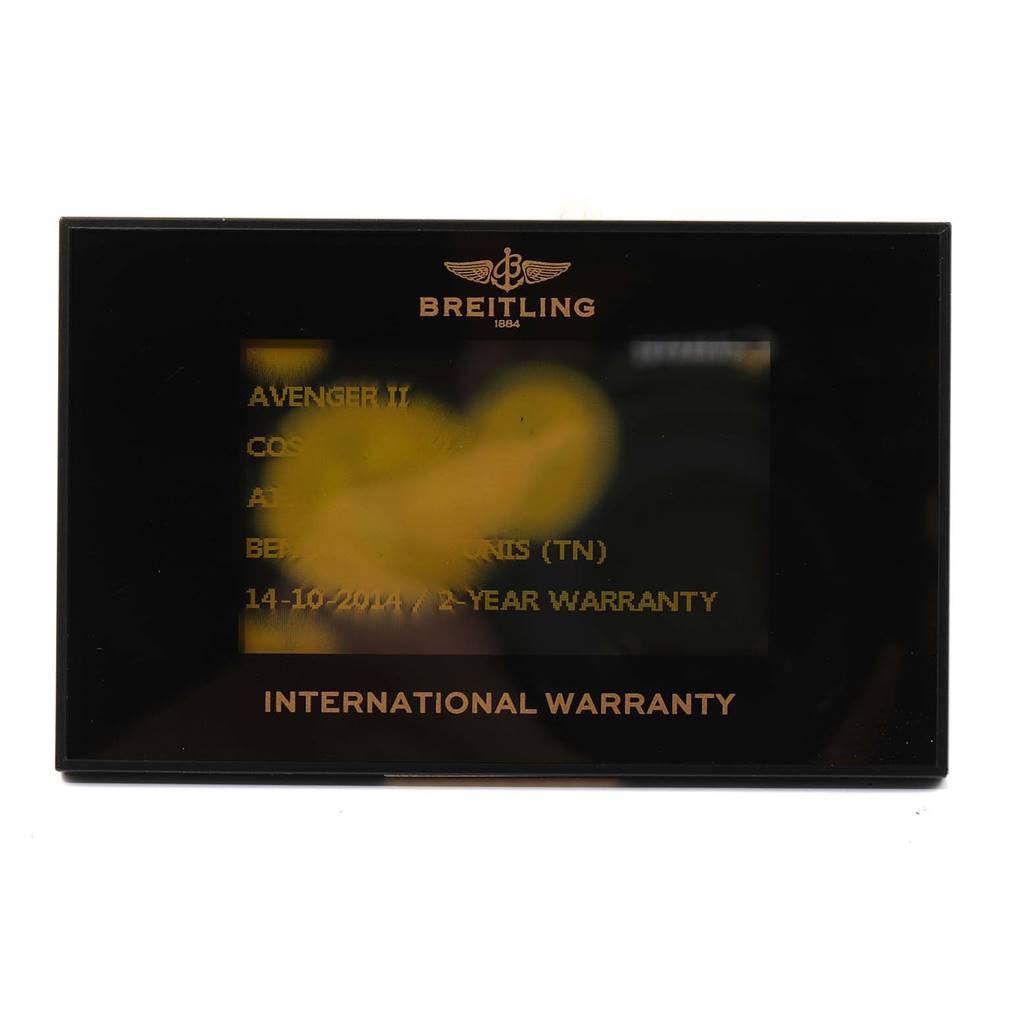 The image shows the Breitling Avenger A13381 Men's Stainless Steel Grey Dial A13381 Men's Stainless Steel Grey Dial II international warranty card from a front angle.