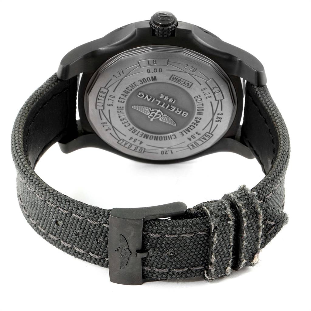 The image shows the back case of a Breitling Avenger V17310 Men's Titanium Black Dial V17310 Men's Titanium Black Dial watch along with its strap and buckle.