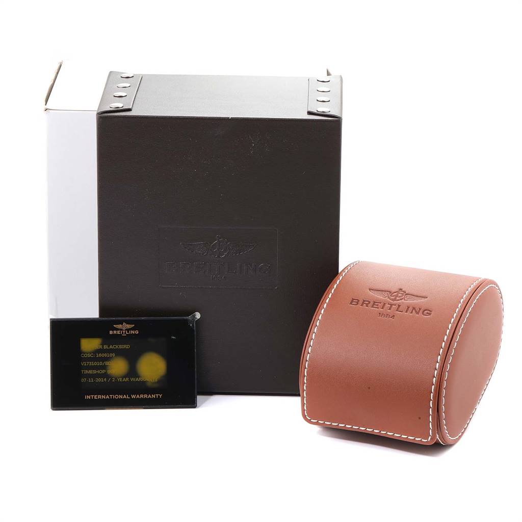 The image shows the packaging, a warranty card, and a leather case for the Breitling Avenger V17310 Men's Titanium Black Dial V17310 Men's Titanium Black Dial watch.