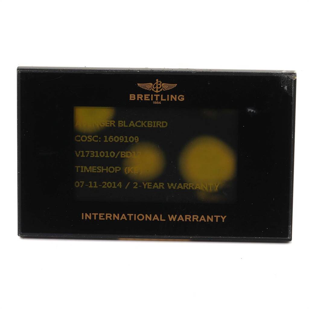 The image shows the international warranty card for a Breitling Avenger V17310 Men's Titanium Black Dial V17310 Men's Titanium Black Dial Blackbird watch.