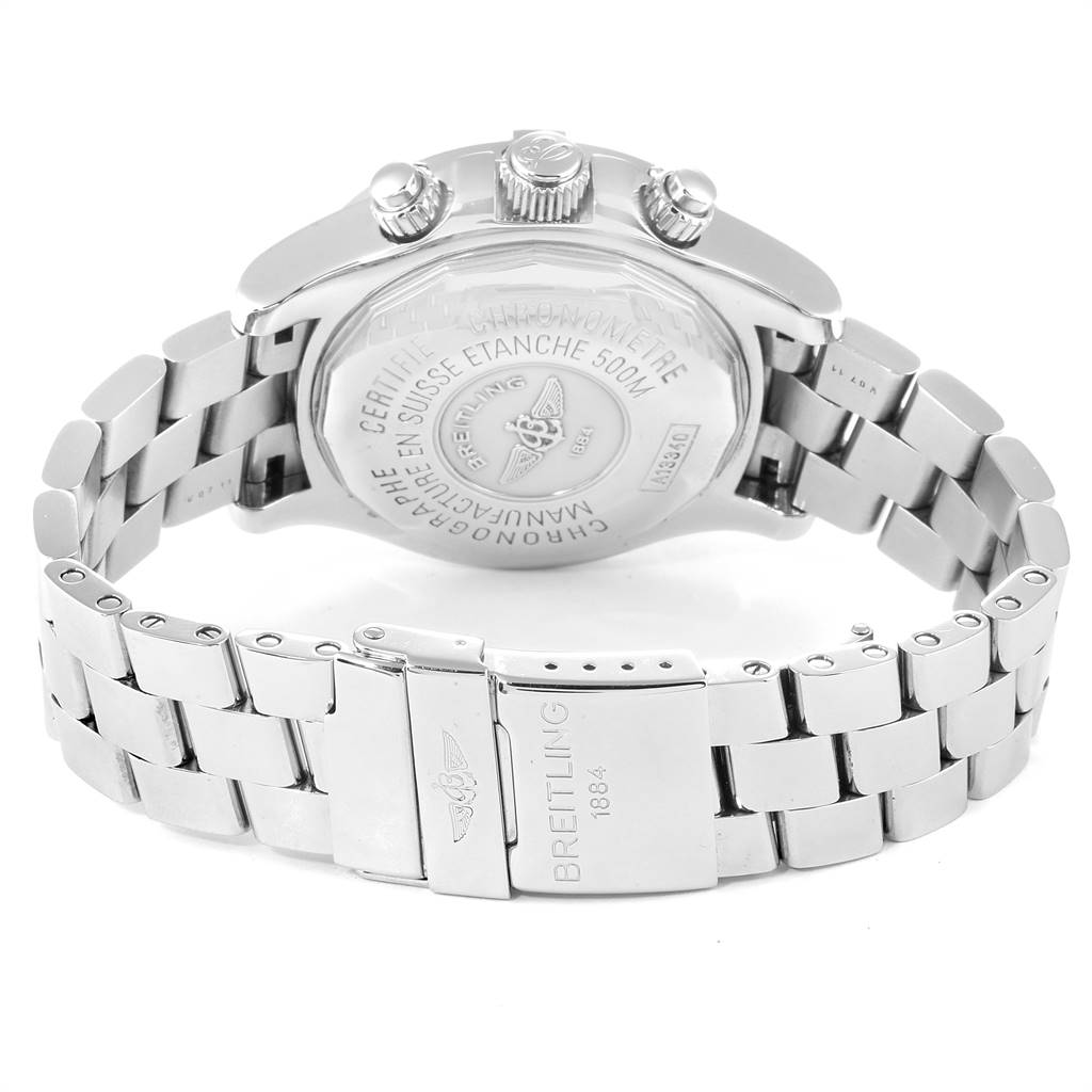 The image shows the back of a Breitling Superocean A13340 Men's Stainless Steel Beige Dial A13340 Men's Stainless Steel Beige Dial watch along with its metal bracelet and clasp.