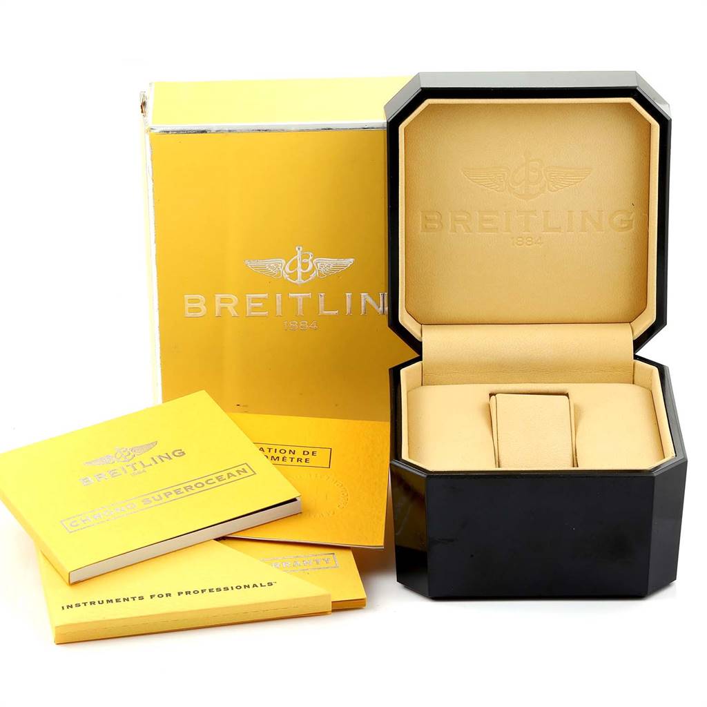 The image shows the packaging and accessories for the Breitling Superocean A13340 Men
s Stainless Steel Black Dial A13340 Men
s Stainless Steel Black Dial watch, including the watch box and instruction manuals.