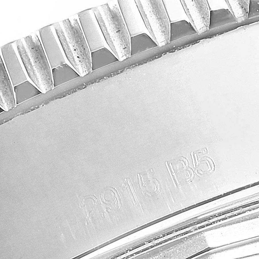 This close-up image shows the case and part of the bezel of a Breitling Superocean A17391 Men
s Stainless Steel Black Dial A17391 Men
s Stainless Steel Black Dial watch with the model number engraved.