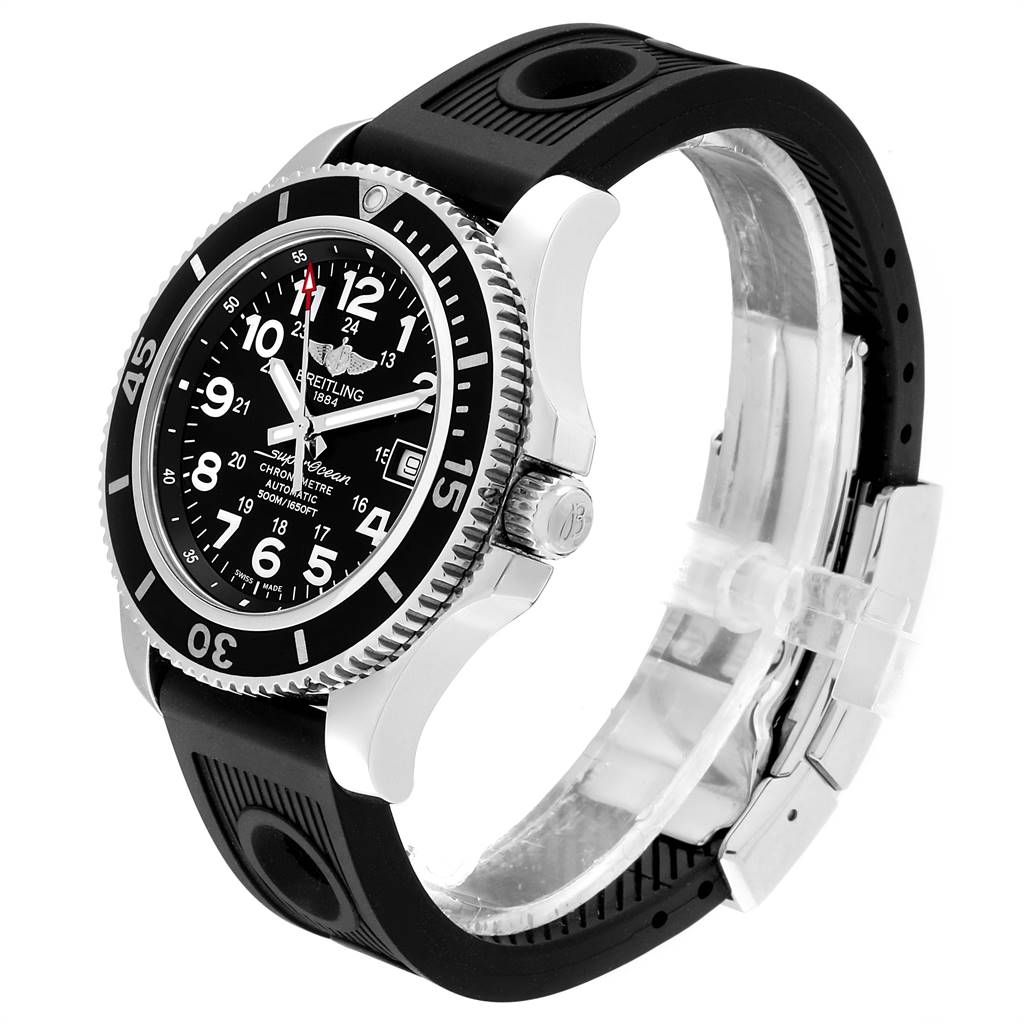 The image shows a side angle of a Breitling Superocean A17391 Men
s Stainless Steel Black Dial A17391 Men
s Stainless Steel Black Dial watch featuring the bezel, crown, dial, and rubber strap with clasp.