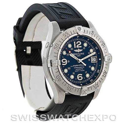 This image shows a Breitling Superocean A1736010/C644 Men's Stainless Steel Blue Dial A1736010/C644 Men's Stainless Steel Blue Dial watch at an angle displaying its face, bezel, and black rubber strap.