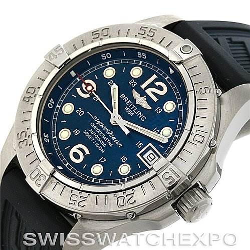 The image shows a Breitling Superocean A1736010/C644 Men's Stainless Steel Blue Dial A1736010/C644 Men's Stainless Steel Blue Dial watch from an angled view, highlighting the blue dial, bezel, and part of the black strap.