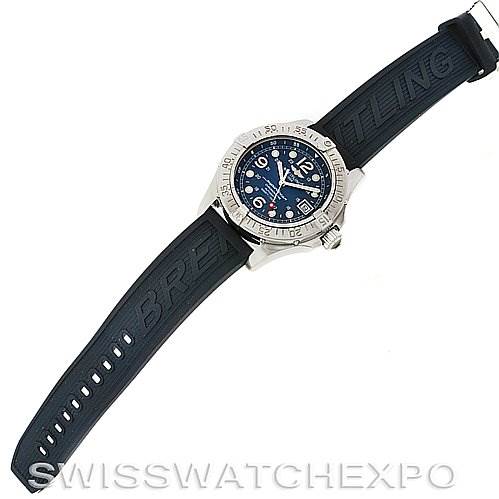The image shows a Breitling Superocean A1736010/C644 Men's Stainless Steel Blue Dial A1736010/C644 Men's Stainless Steel Blue Dial watch from a top-down angle, featuring its case, bezel, and embossed rubber strap.