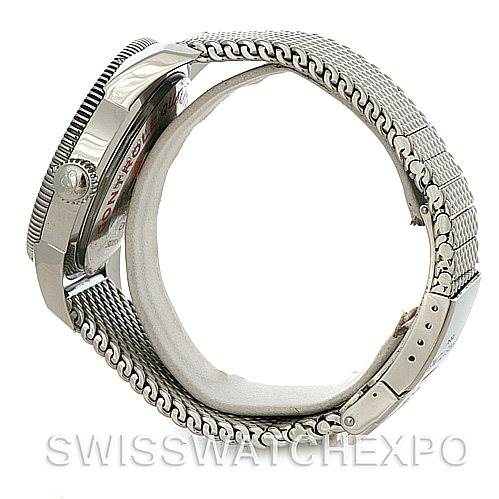 The image shows a side view of a Breitling Superocean A17320 Men's Stainless Steel Blue Dial A17320 Men's Stainless Steel Blue Dial watch displaying its metal mesh bracelet and the crown side of the watch case.