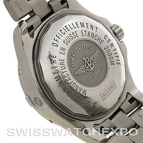 The image shows the back case and bracelet of a Breitling Superocean A17390 Men's Stainless Steel Silver Dial A17390 Men's Stainless Steel Silver Dial watch, detailing the engraving and certification information.
