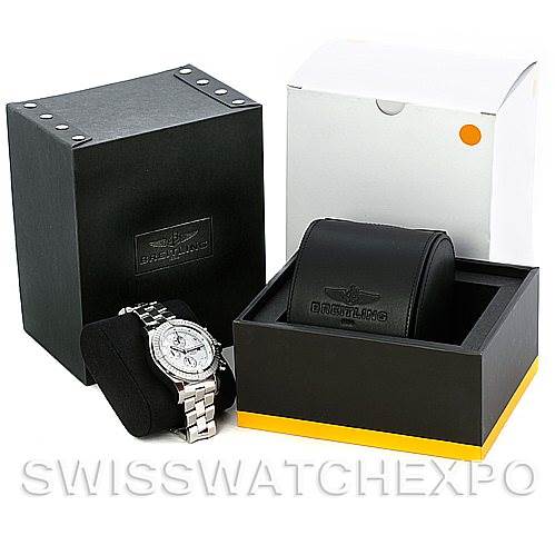The image shows a Breitling Avenger A13370 Men's Stainless Steel White Dial A13370 Men's Stainless Steel White Dial watch alongside its black and white packaging boxes with the watch presented on a display cushion.