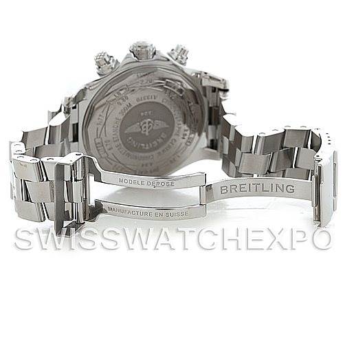 The image shows the back of a Breitling Avenger A13370 Men's Stainless Steel White Dial A13370 Men's Stainless Steel White Dial watch, focusing on the stainless steel bracelet and engraved case back.