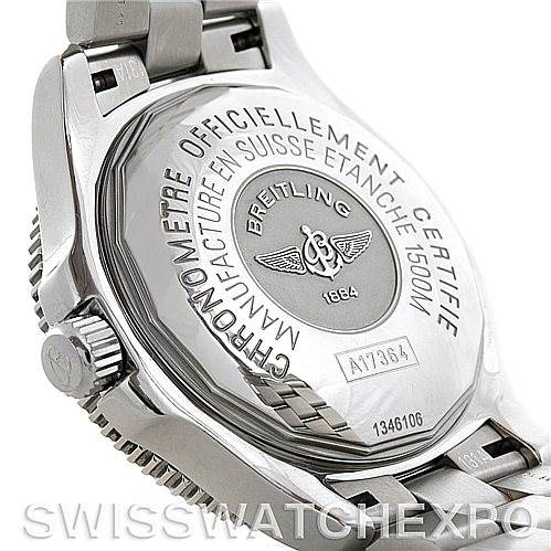 The image shows the back case and crown of a Breitling Superocean A17364 Men's Stainless Steel Black Dial A17364 Men's Stainless Steel Black Dial watch, emphasizing its engravings and stainless steel bracelet.