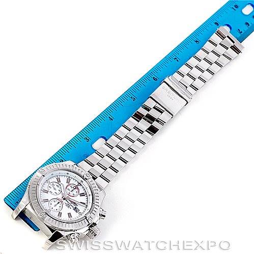 The image shows a top-down view of a Breitling Avenger A13370 Men's Stainless Steel White Dial A13370 Men's Stainless Steel White Dial watch, displaying its bezel, dial, and metal bracelet alongside a ruler for size reference.