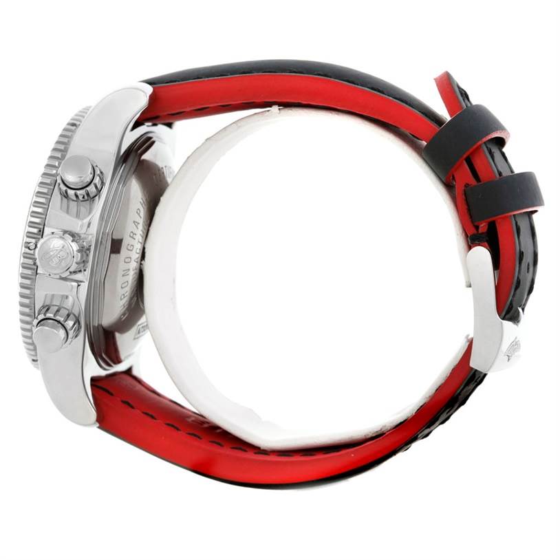 This image shows the side view of a Breitling Superocean A73310 Men's Stainless Steel Black Dial A73310 Men's Stainless Steel Black Dial watch, highlighting its bezel, pushers, crown, case, and red-lined band.