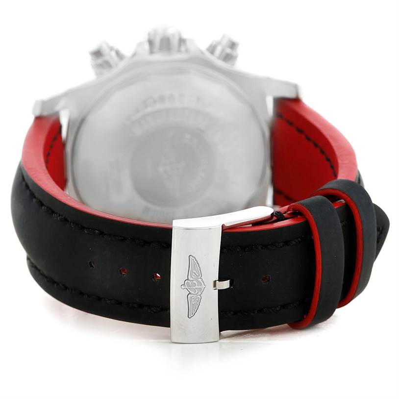 This image shows the rear angle of a Breitling Superocean A73310 Men's Stainless Steel Black Dial A73310 Men's Stainless Steel Black Dial watch, focusing on the black and red rubber strap with a metal clasp.