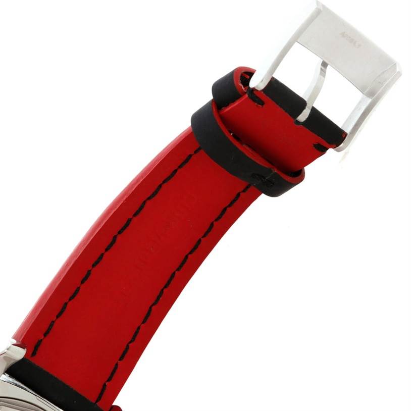 This image shows the red and black strap and buckle of a Breitling Superocean A73310 Men's Stainless Steel Black Dial A73310 Men's Stainless Steel Black Dial watch at an angle.