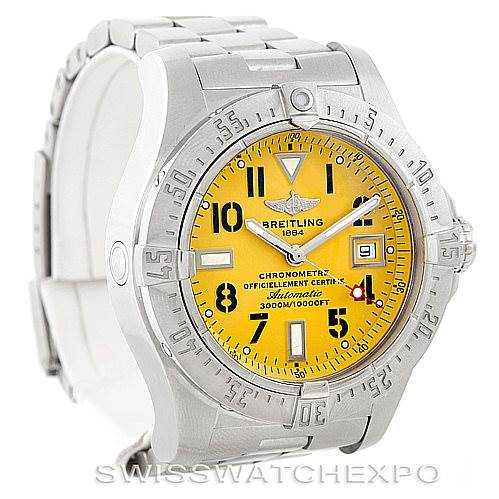 The image shows a Breitling Avenger A17330 Men's Stainless Steel Yellow Dial A17330 Men's Stainless Steel Yellow Dial watch featuring a yellow dial, bold numerals, and stainless steel case and bracelet, viewed from a front-left angle.