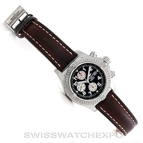 The image shows a top-down view of the Breitling Avenger A13370 Men's Black Dial A13370 Men's Black Dial watch, highlighting its brown leather strap, black dial, and stainless steel case.